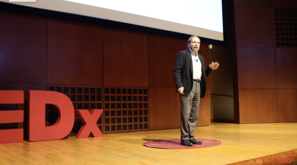 Cornell ORIE Professor David Shmoys on the stage at TEDx Cornell in 2022