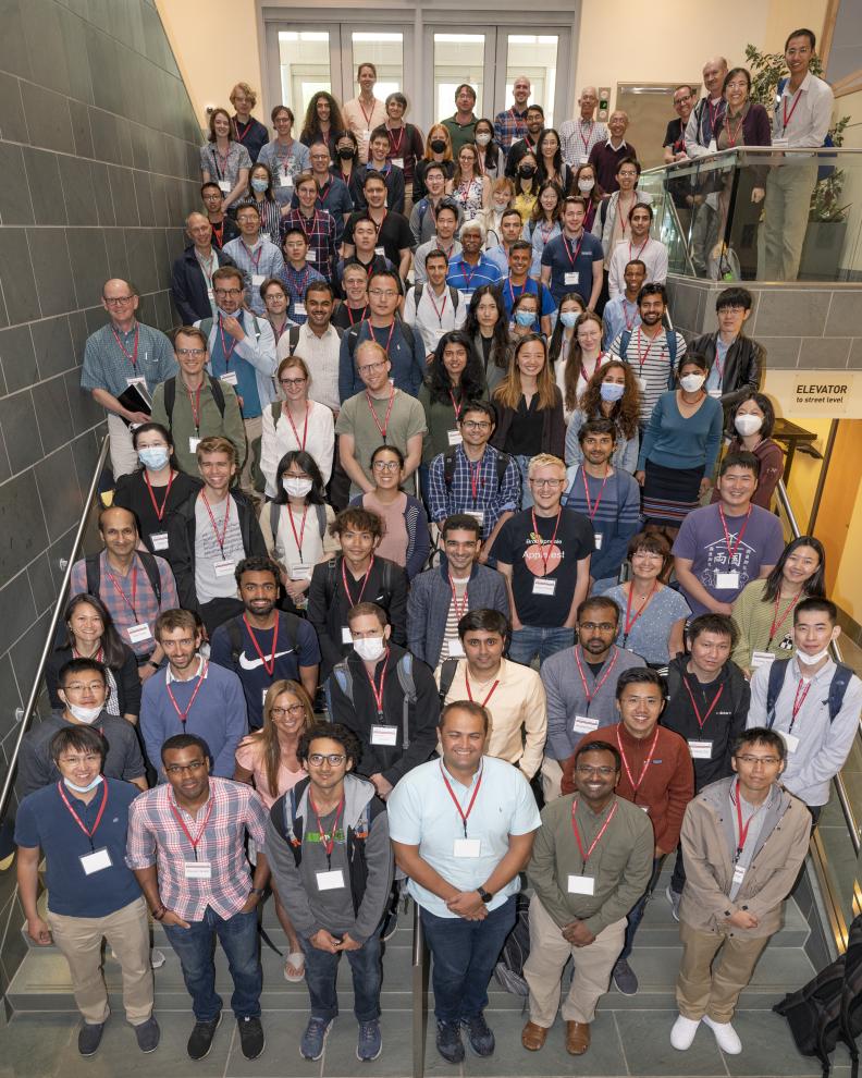 Group photo of the attendees at the 2022 Stochastic Networks Conference on the main stairway in Duffield Hall.