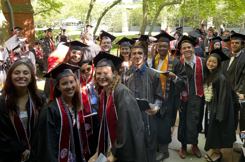 Some ORIE undergrads in their caps and gowns, waiting outside of Sage Chapel for the ceremony to begin.
