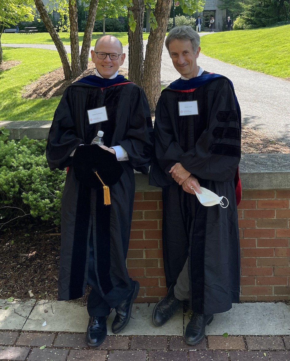 2 ORIE faculty outside of Saga Chapel, waiting for the UG ceremony to sart.