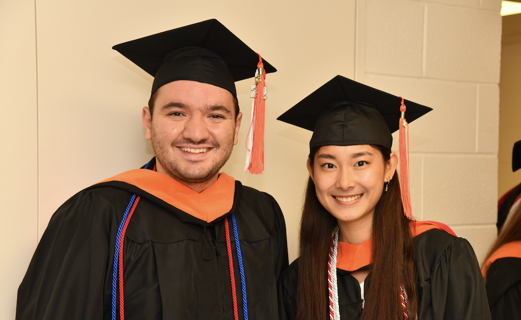 Two ORIE M.Eng. students at graduation.